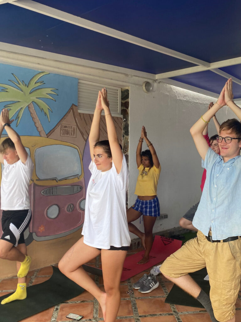 Participants trying some morning yoga