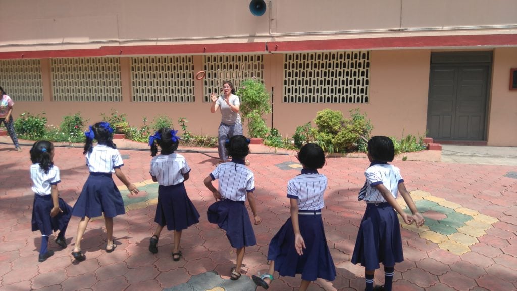 Children outside with the teacher