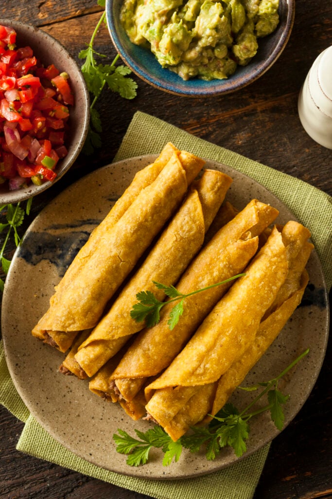 Homemade Mexican Beef Taquitos with Cilantro and Salsa
