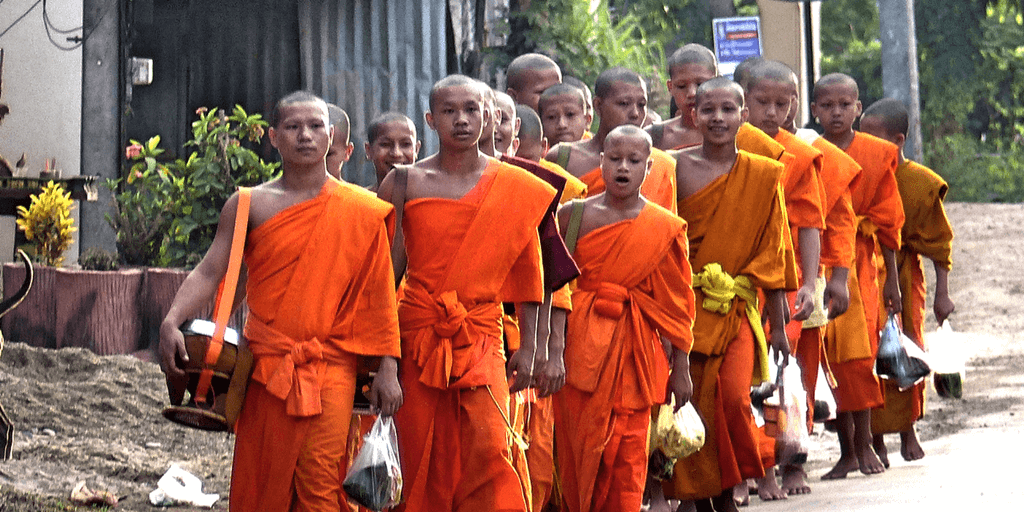 monks collecting alms