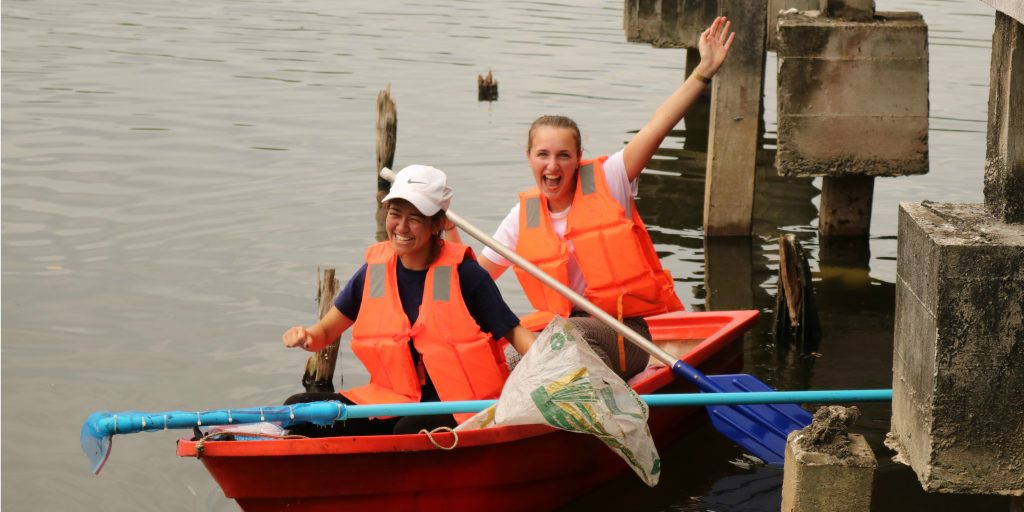 GVI volunteers participate in a lake clean up in Phang Nga, Thailand