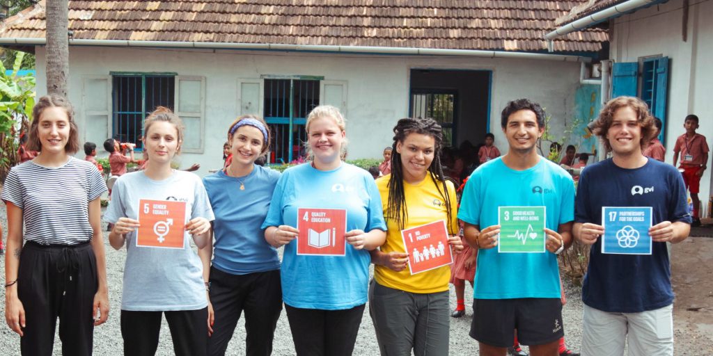 GVI volunteers demonstrate which of the United Nations Sustainable Development Goals (UN SDGs) they are working toward in Kerala, India.