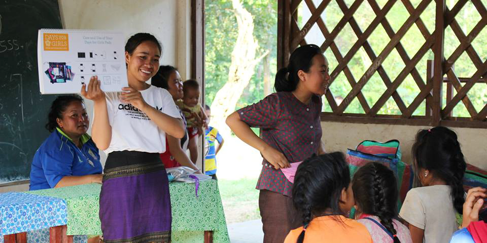 A GVI community liason takes part in leadership development while delivering the menstrual health program in rural Laos.