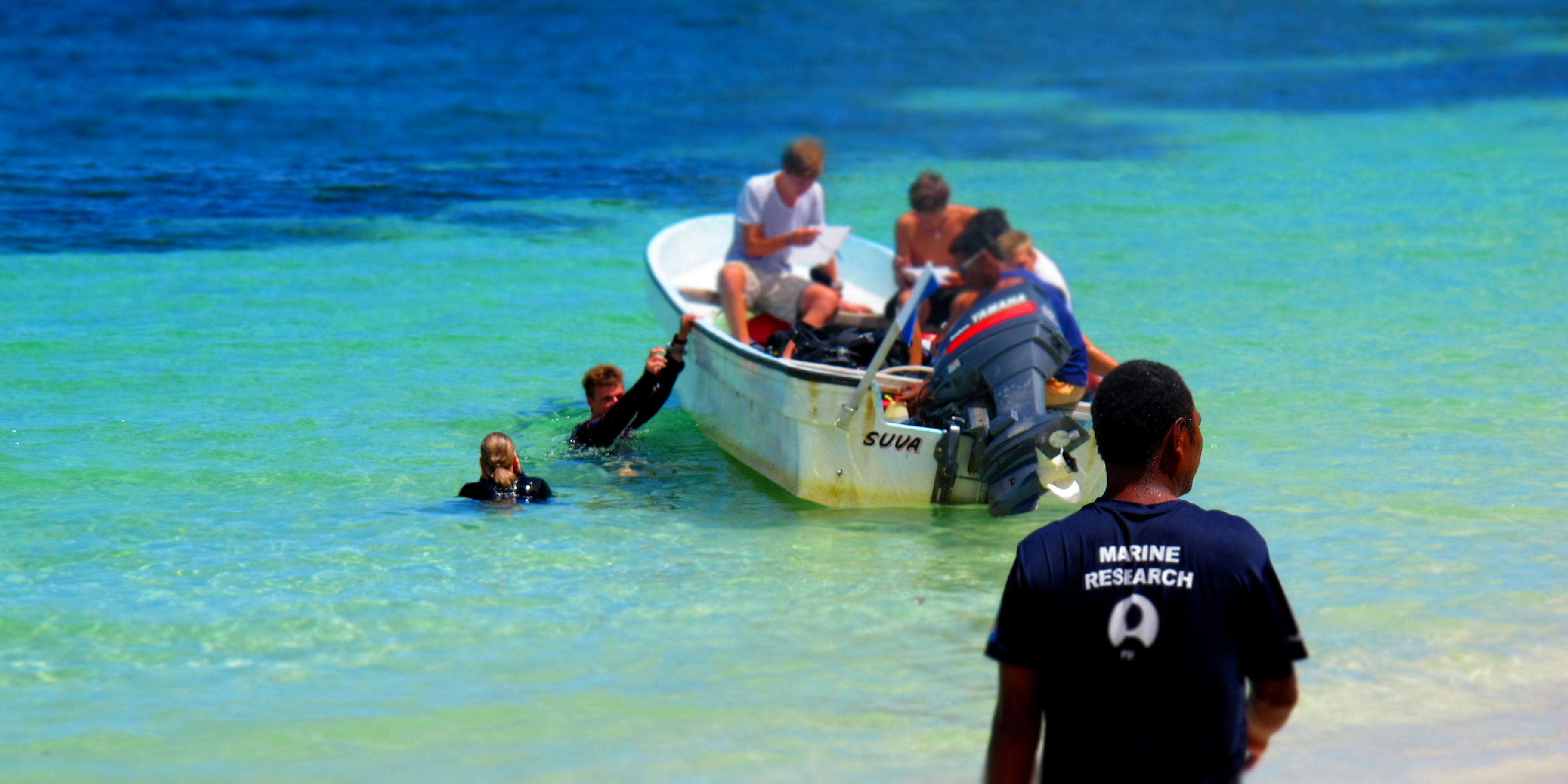 GVI participants head out to dive, as part of earning their PADI advanced open water. 