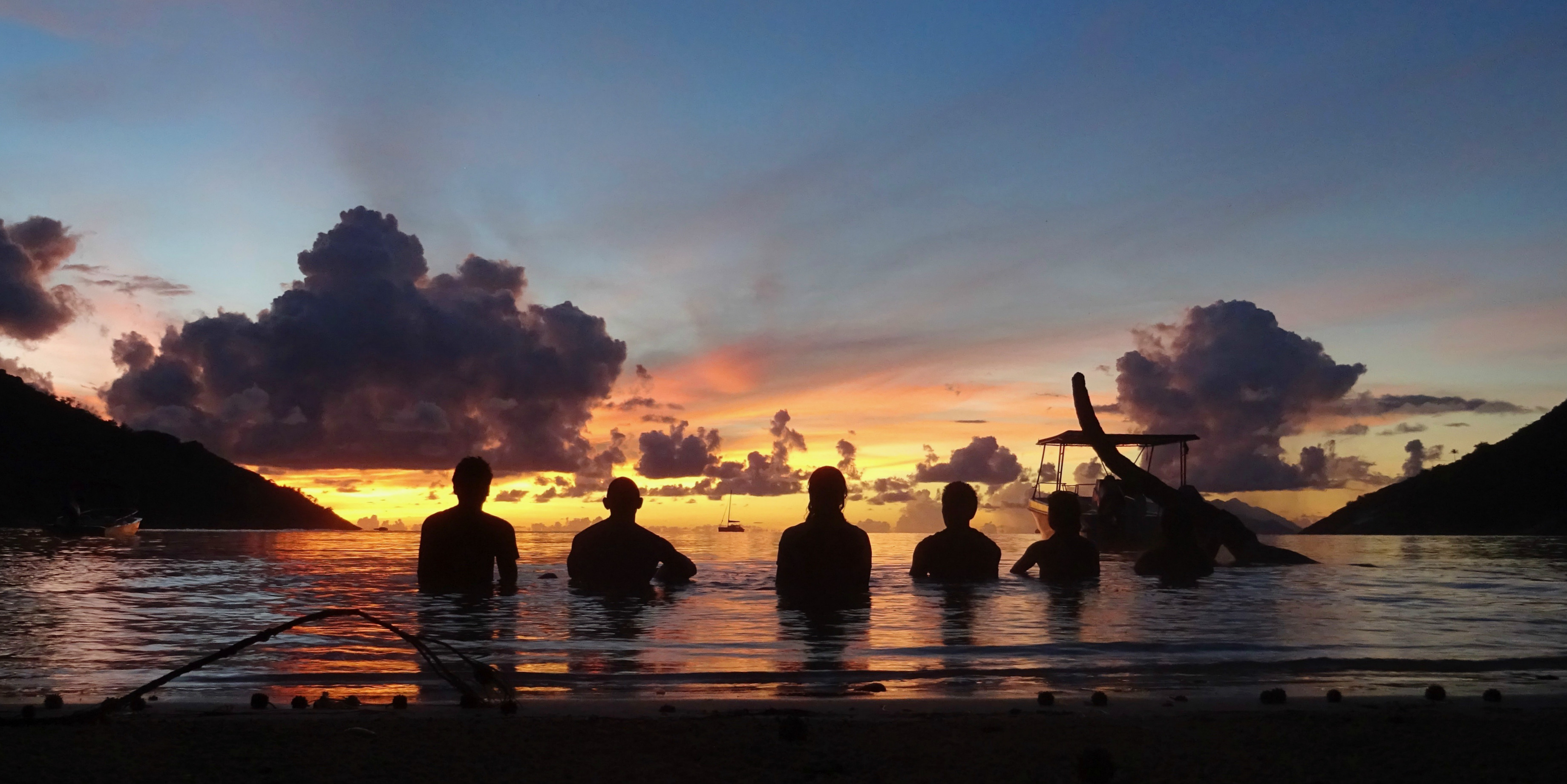 Soon to be PADI pros enjoy the calm waters of Mahe, Seychelles, just metres away from the GVI base.