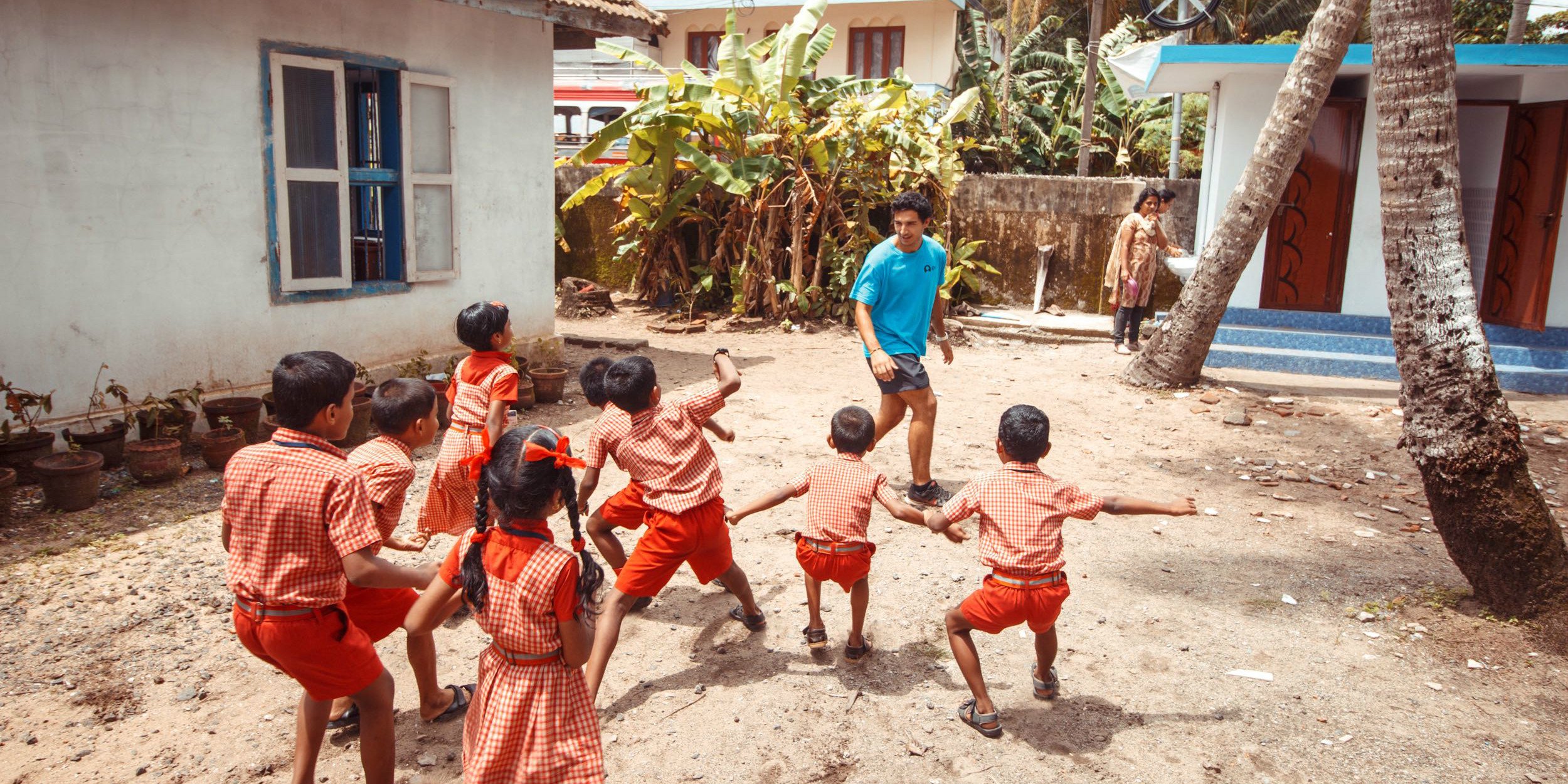 A GVI participant leads a class in sports. This international community development program focuses on health and wellness in India.