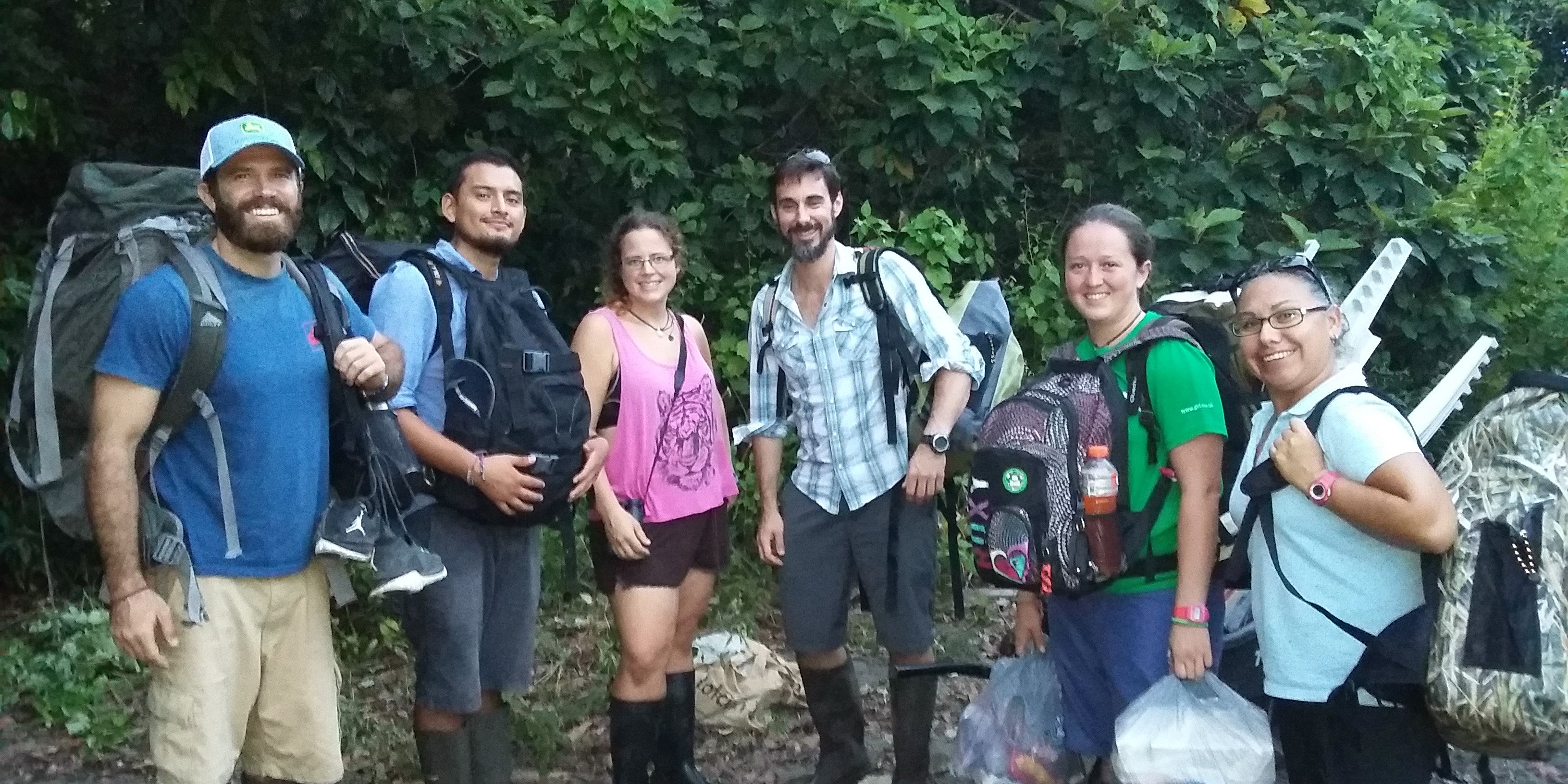 Participants prepare for to trek through the jungles of Jalova on a data collection trip. This science expedition makes our list of the best volunteer abroad programs for adults.
