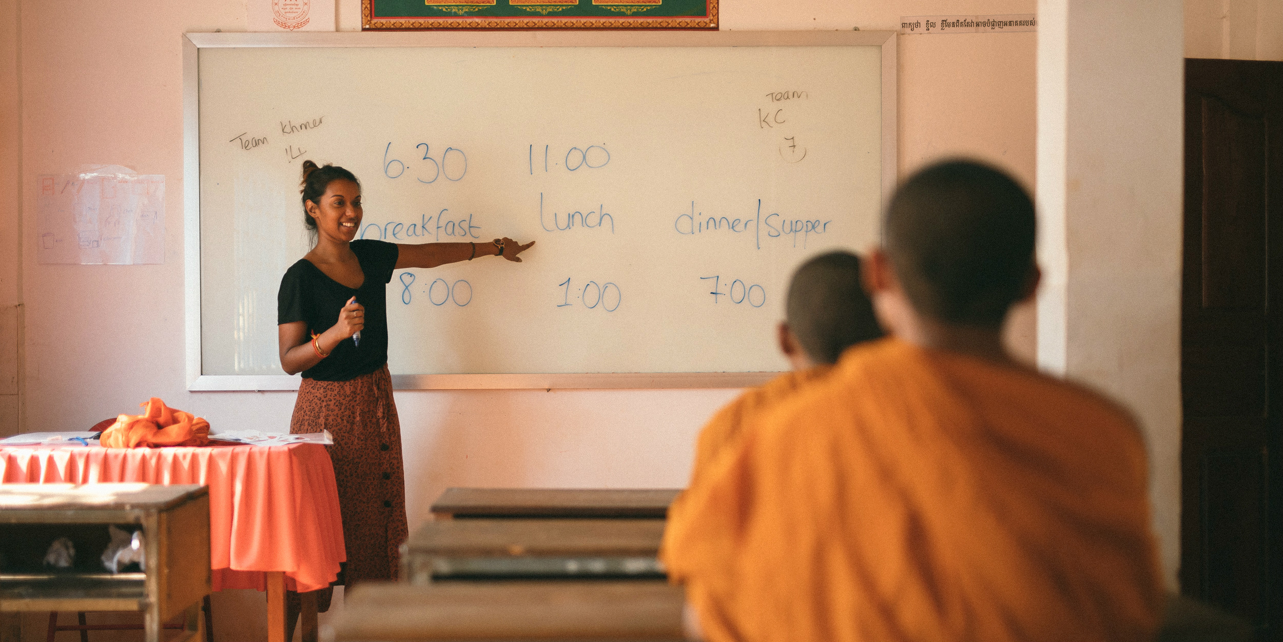 A GVI participant leads a lesson on meal times in a temple school after earning their TEFL qualification with GVI.