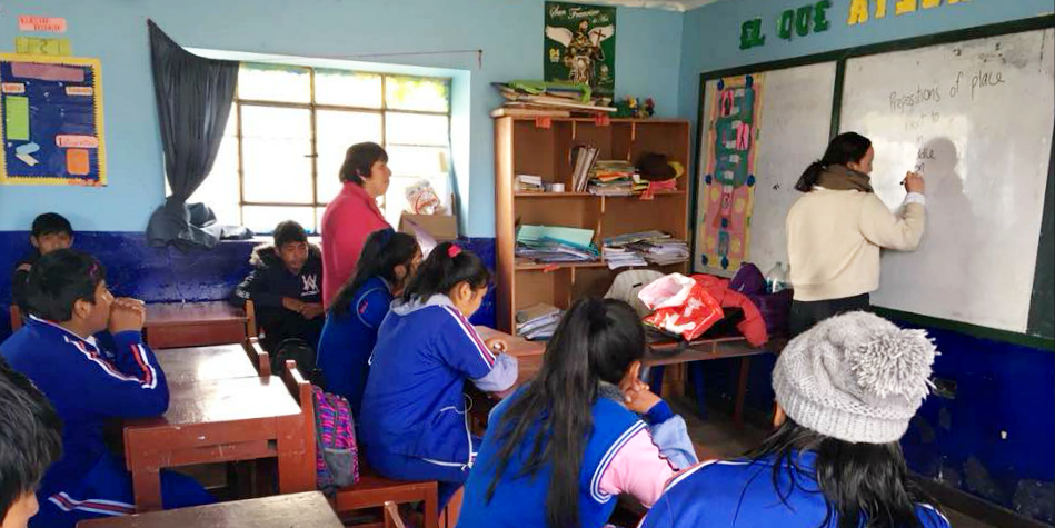 Gap year volunteers lead an English lesson with children in Cusco, Peru.