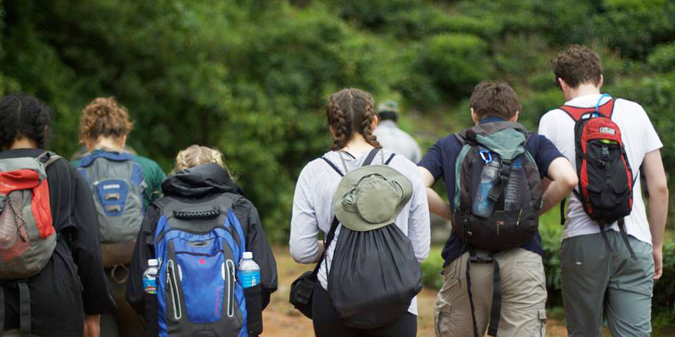 Wondering what to pack for a school trip abroad? These teen volunteers are well-organised with hats, backpacks and hiking shoes.