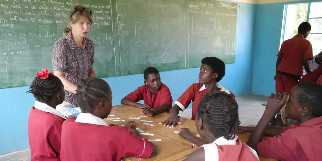 A participant leads a lesson as a volunteer in Zambia.