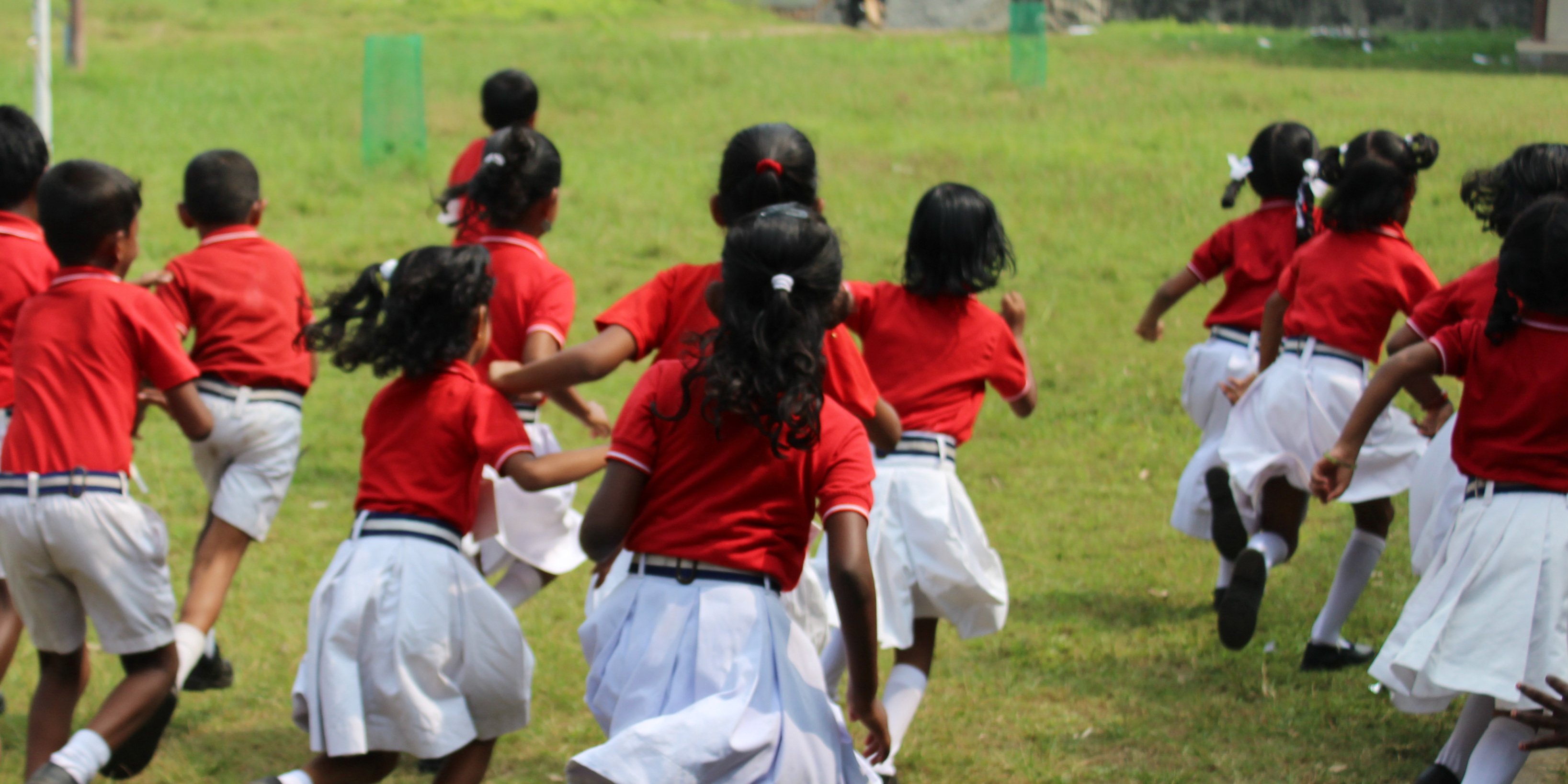 Schoolchildren take part in a sports program with GVI participants who are volunteering in India.