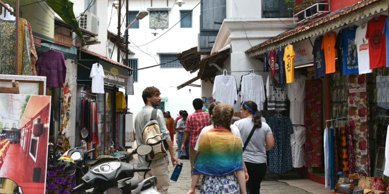 GVI participants walk through the streets of Kochi. When travelling to India with GVI, you should take out travel insurance.