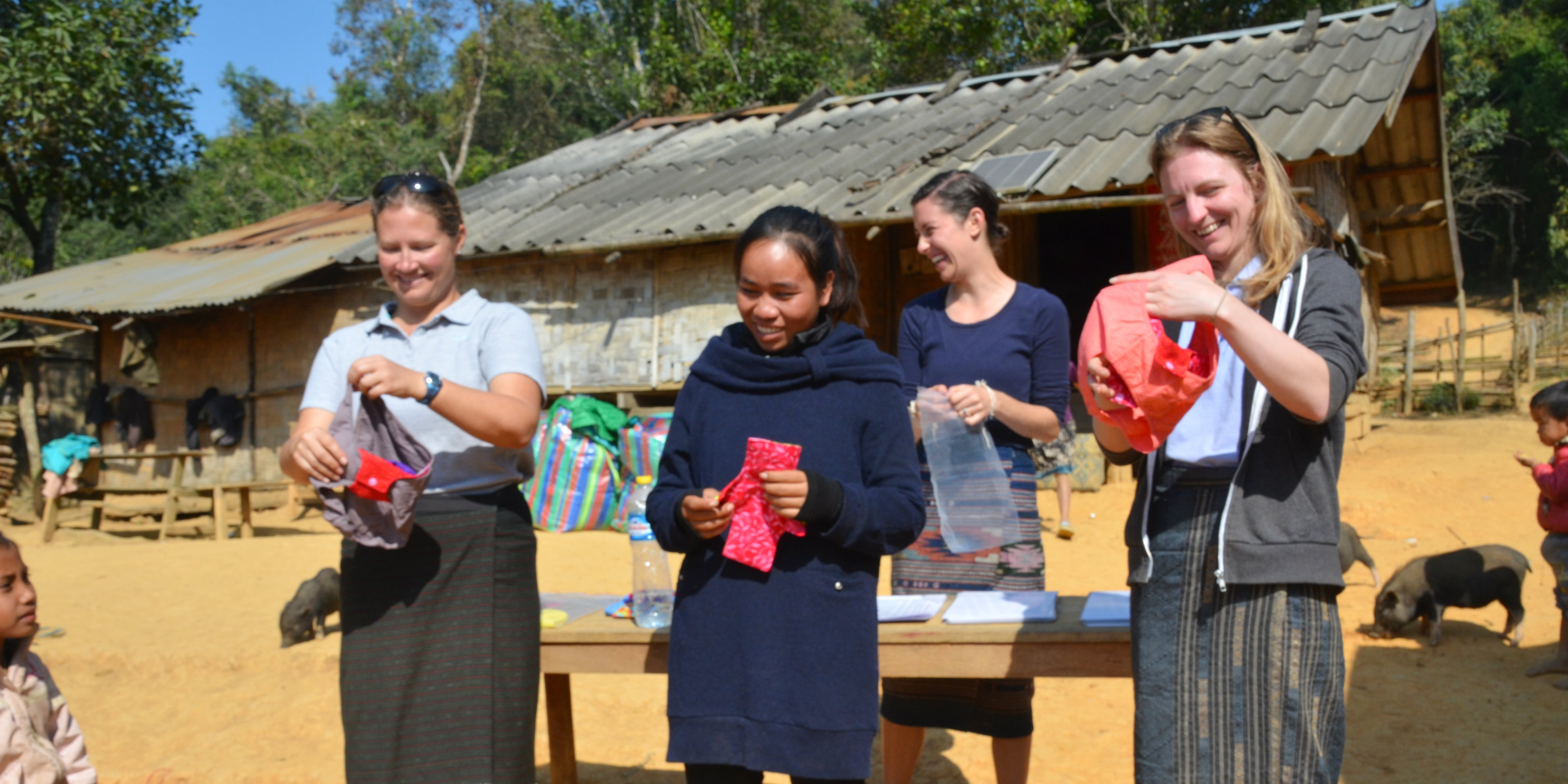 GVI staff demonstrate how the Days for Girls menstrual health kits are used.