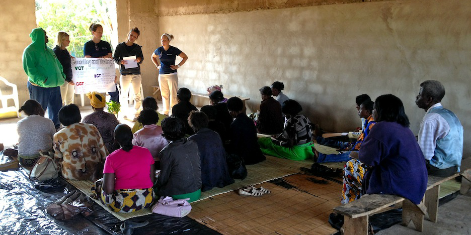 Pariticipants who volunteer in Zambia lead an education session.