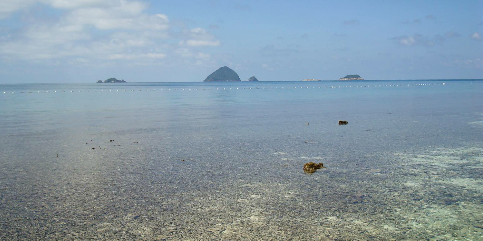 A shot of the ocean surrounding the Perhentian Islands shows broken coral reefs. Coral reef conservation is important on to conserve these popular islands.