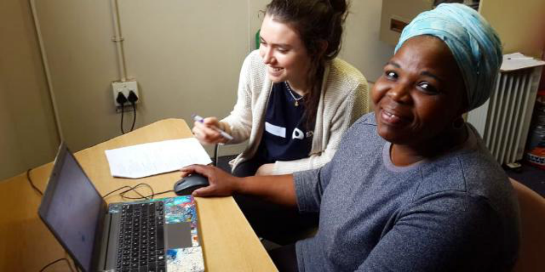 A woman participates in a computer literacy workshop as part of a GVI women's empowerment program.