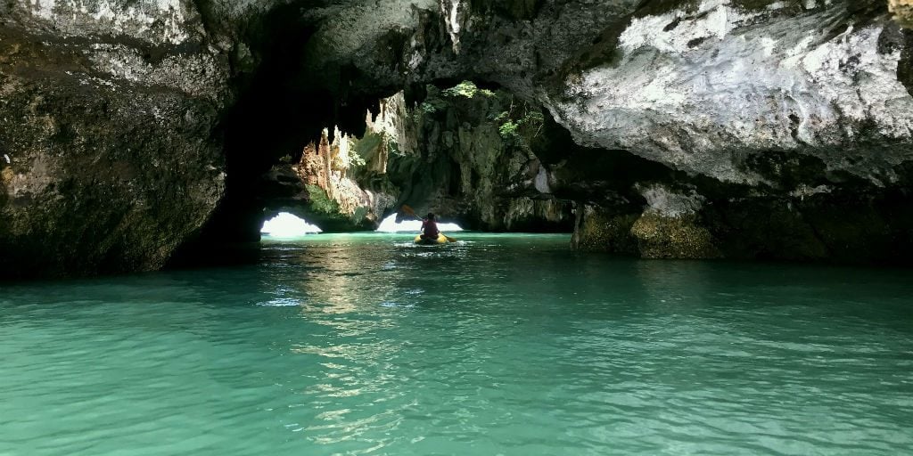 Phang Nga boat tours take volunteers to beautiful, quiet caves.