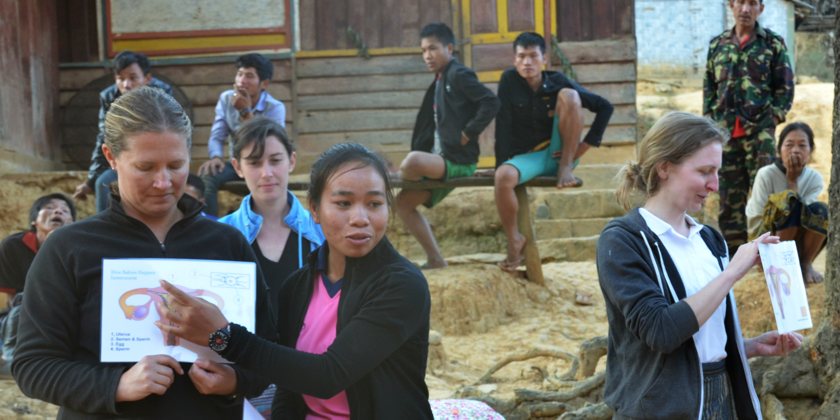 A Laos woman leads a menstrual health awareness workshop in a rural village, as part of community development in the region.