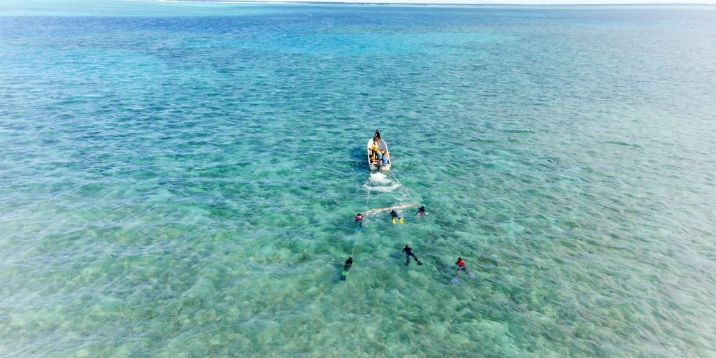 One of the marine protected area assessment methods is manta towing, conducted at high tide.