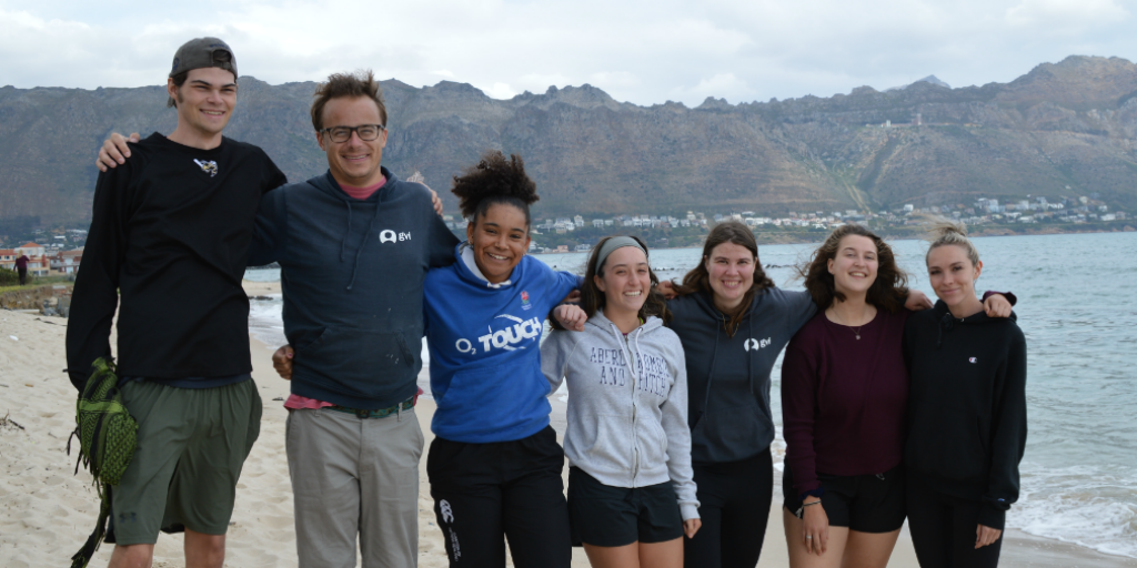 A group of GVI volunteers on a beach