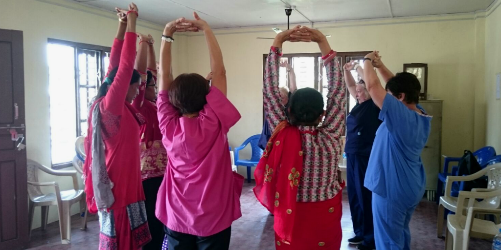 Nurses leading stretching exercises in Kerala