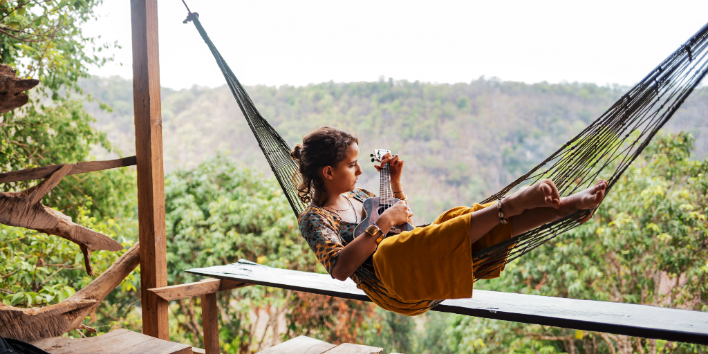 Girl relaxing on a hammock in Thailand