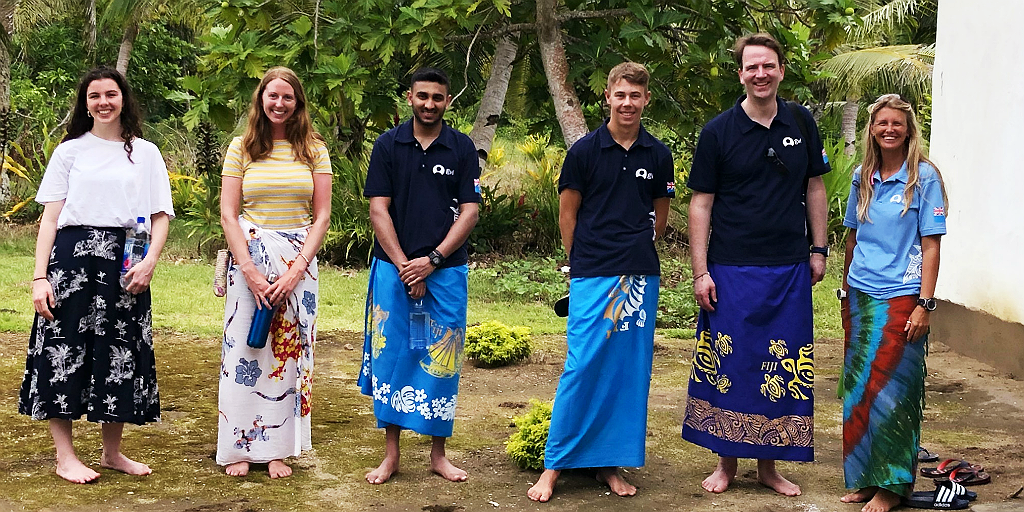 gvi volunteers immersed in caqalai culture wearing traditional attire