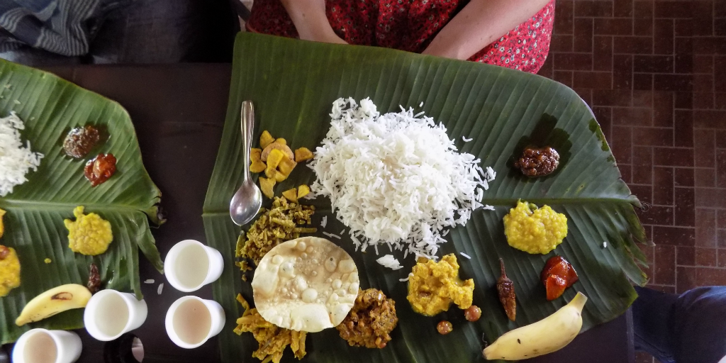 Traditional Indian food served on a banana leaf