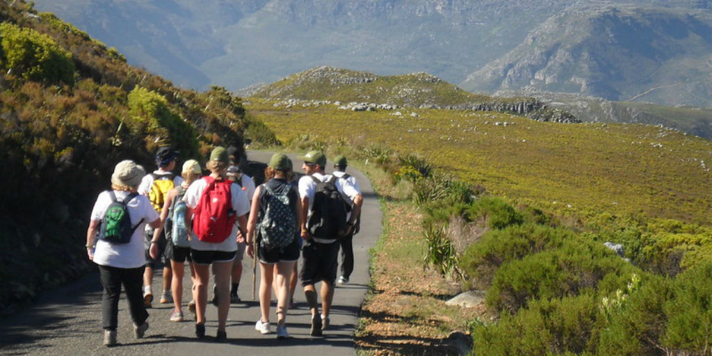 Participants enjoy a hike while on a gap year from college. 