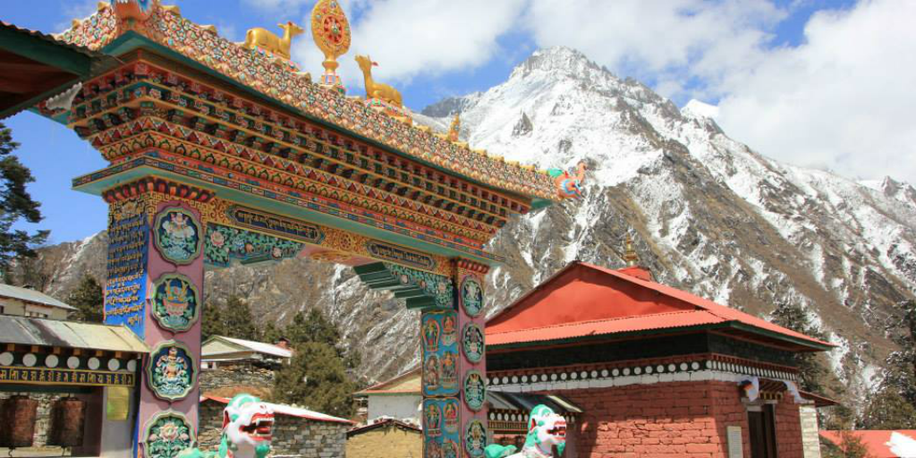 An intricately carved archway in the Napalese mountains.