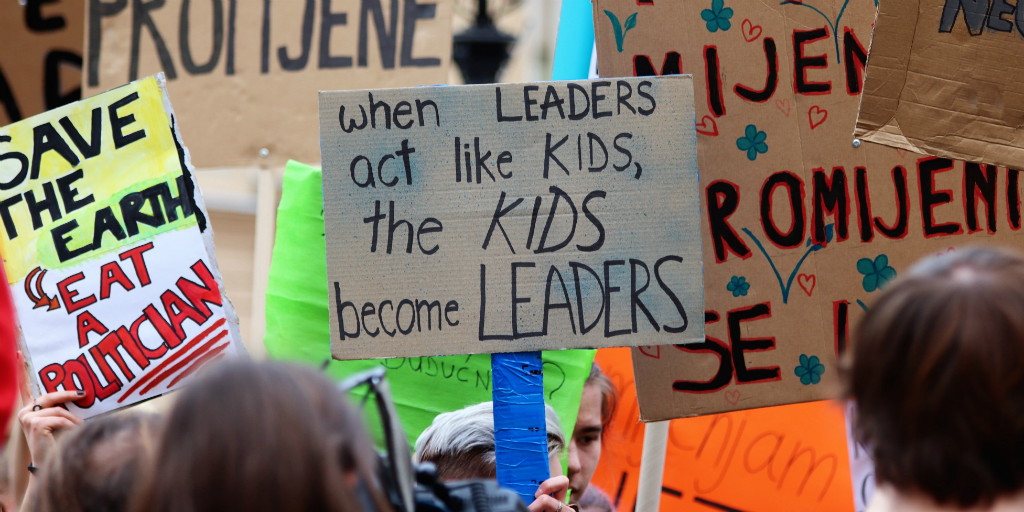 Placards held by students taking part in a Friday for future strike.