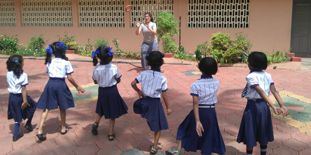 Volunteer with children on one of our India volunteer trips.