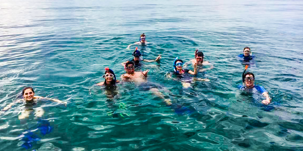 Volunteers snorkeling during their free time in the Phang Nga province of Thailand