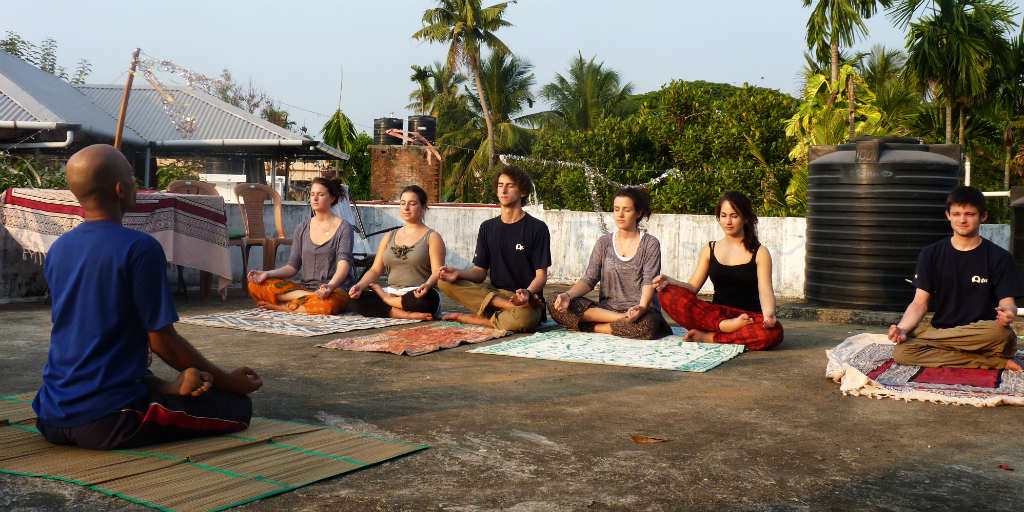 Try meditative yoga in Kochi India.