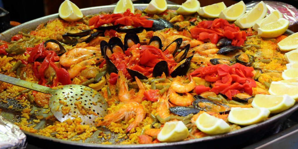 Learn to speak Spanish over a meal of Spanish paella.