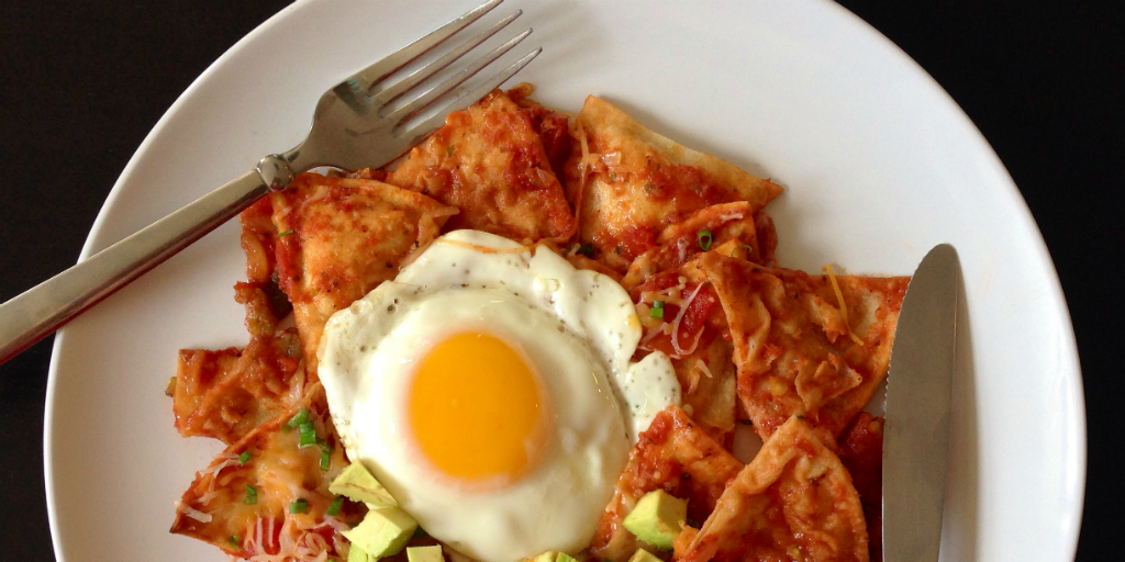 Enjoy a plate full of Chilaquiles when you volunteer and travel in Mexico