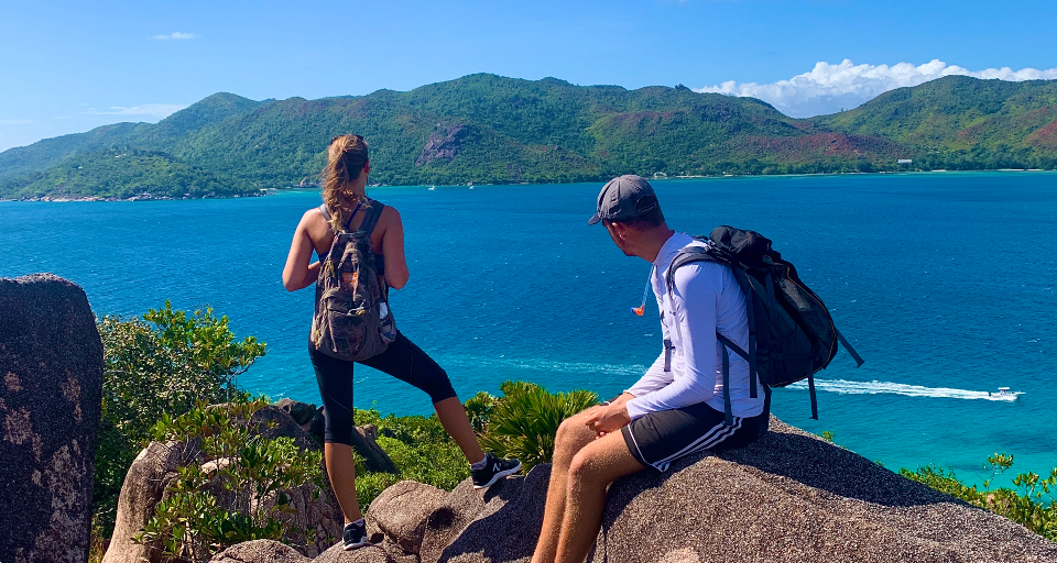 2 Volunteers on hike admiring view