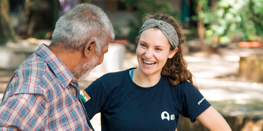 a participant in India working on a research expedition out in the field