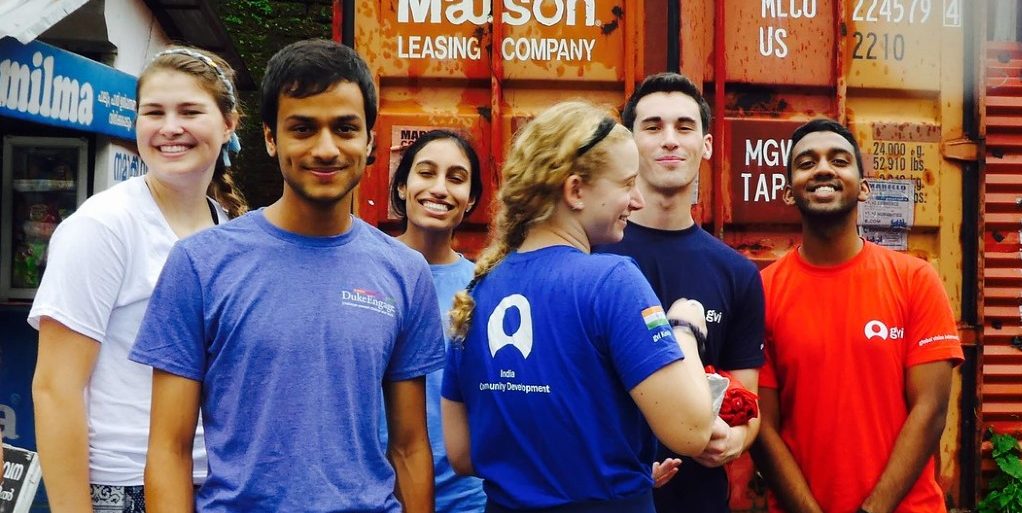 Group of participants happily travelling abroad on a group expedition.