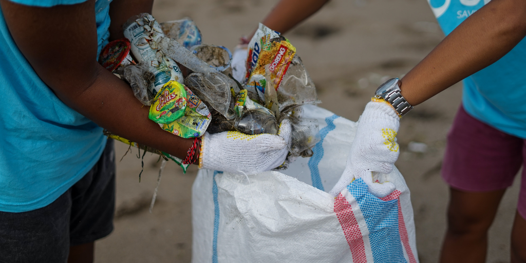 volunteers taking part in a beach cleanup
