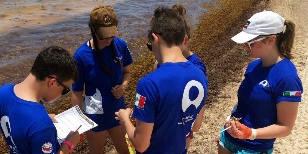 A group of participants fill in survey details while on one of GVI's gap year programs abroad.