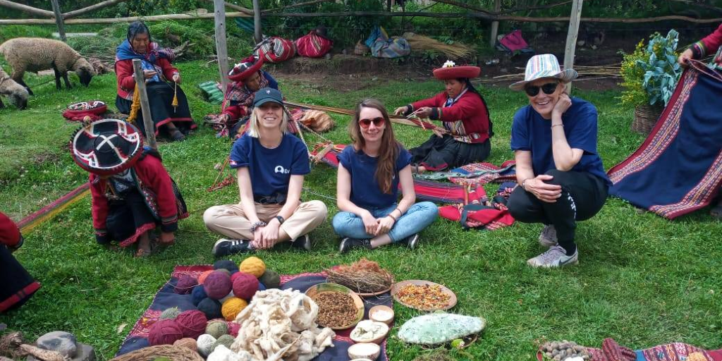 The GVI volunteers enjoy a cultural experience with the local community members. 