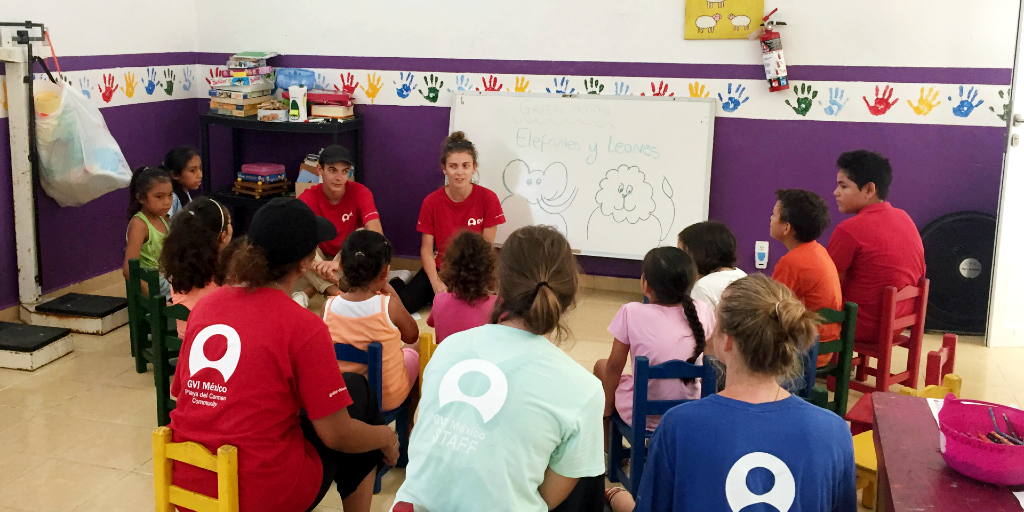 A lady learns the Spanish language by immersion and teaching. 