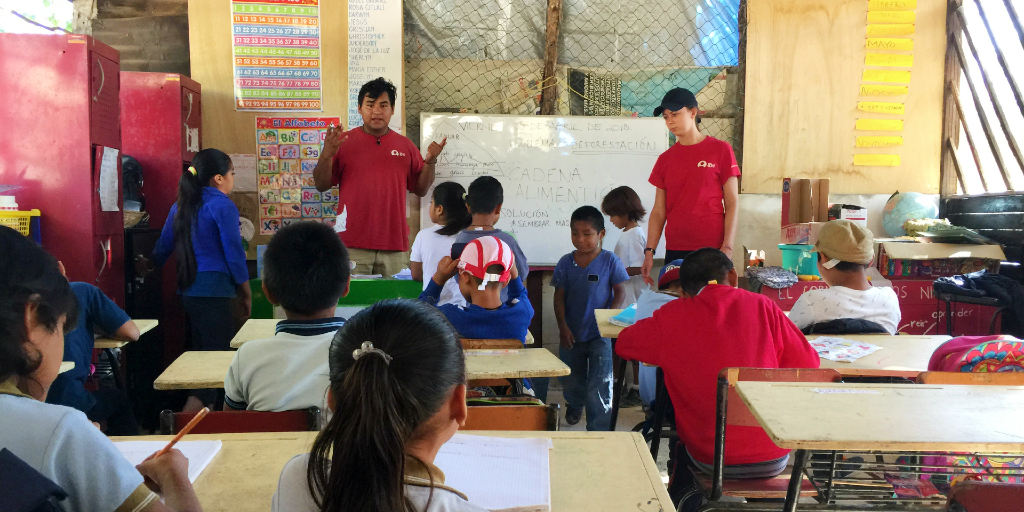 The children are being taught English during a language immersion program. 