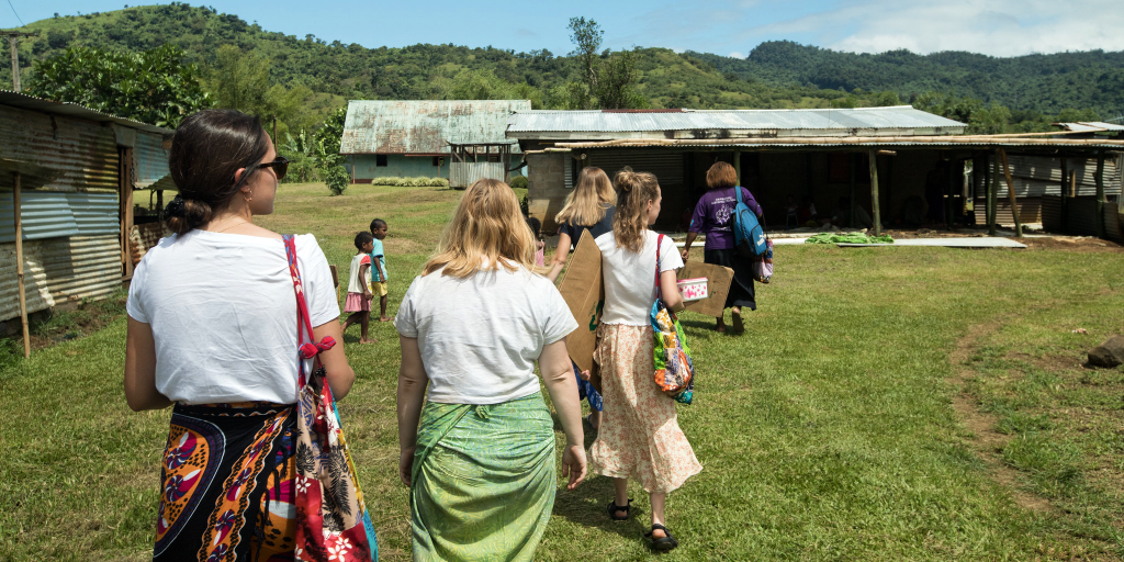 The GVI volunteers are walking towards their next adventure on base. 