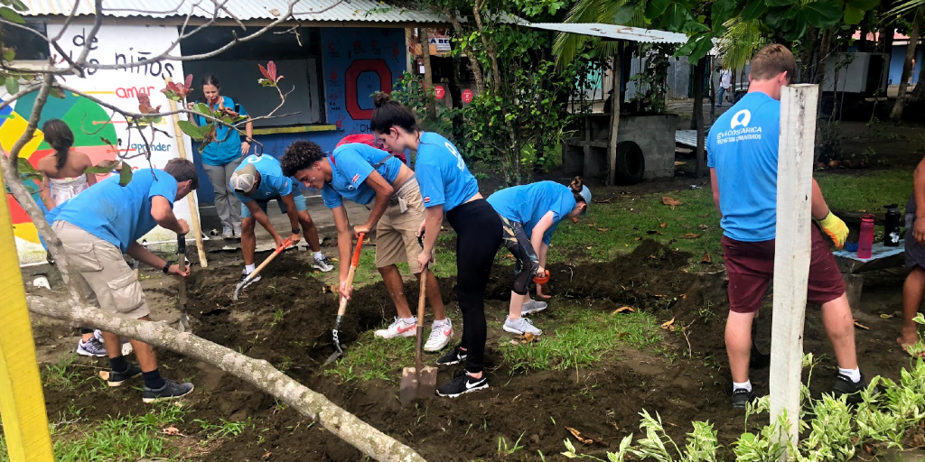 GVI 15 year olds are busy with a community garden project. 