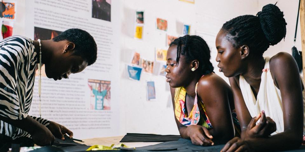 Ghanaian women work on textiles as part of a GVI skills development program. Getting involved in programs like these is one of our top gap year ideas.