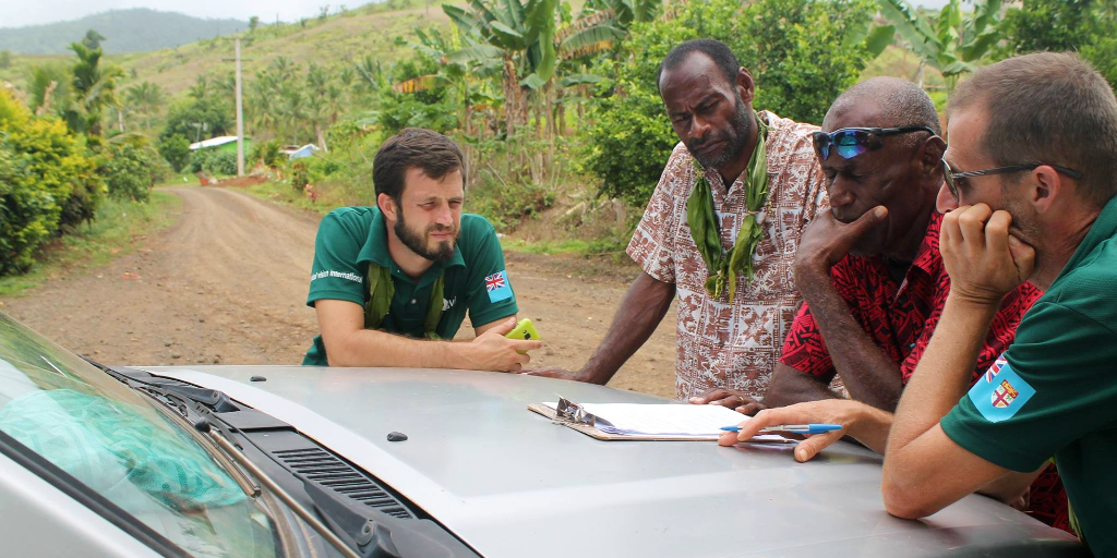 GVI program managers as well as the community of Fiji, discussing important matters. 